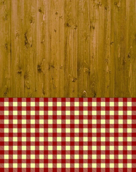 พื้นหลังไม้แบบดั้งเดิมด้วยผ้าปูโต๊ะสีแดงสีเหลือง — ภาพถ่ายสต็อก