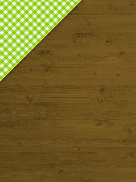 Wooden texture with green tablecloth pattern — Stock Photo, Image