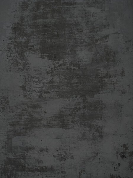 Grunge background of dark grey concrete wall