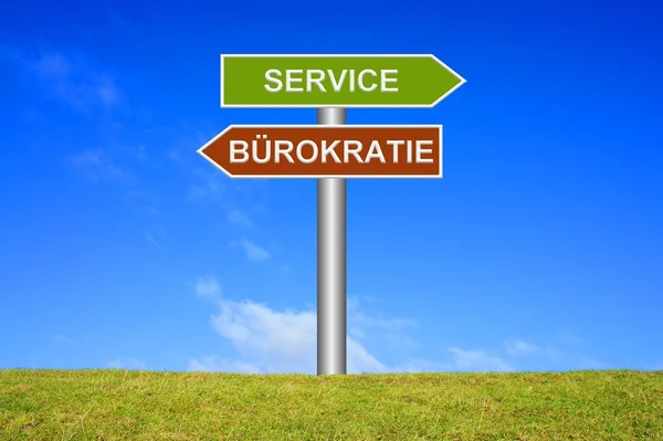 Wegweiser - Bürokratie oder Dienstleistung — Stockfoto