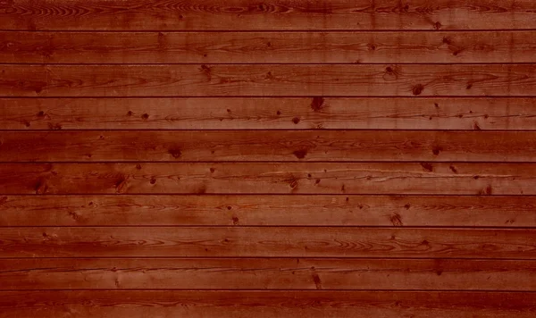 Holzhintergrund mit roten Planken — Stockfoto