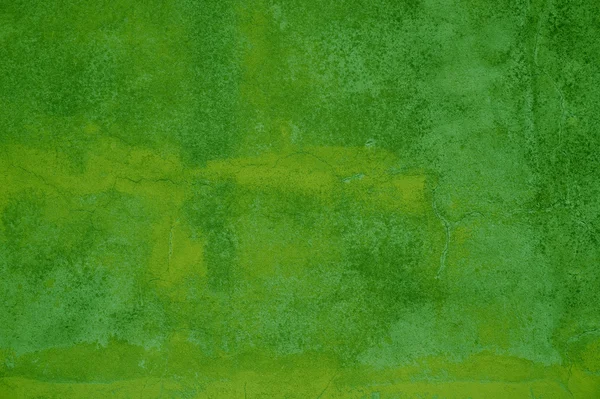Grunge Background of green and yellow stone wall