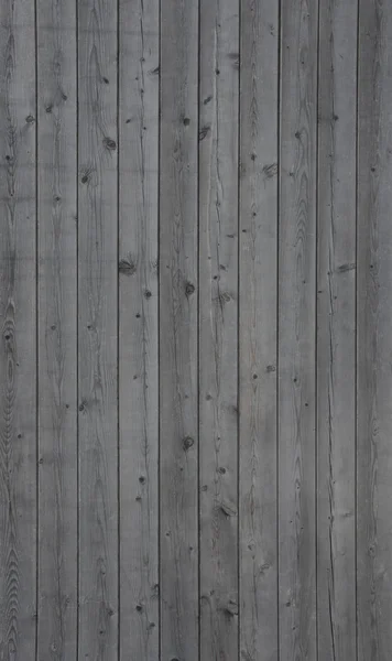 Vertical background of an old gray wooden wall — Stock Photo, Image