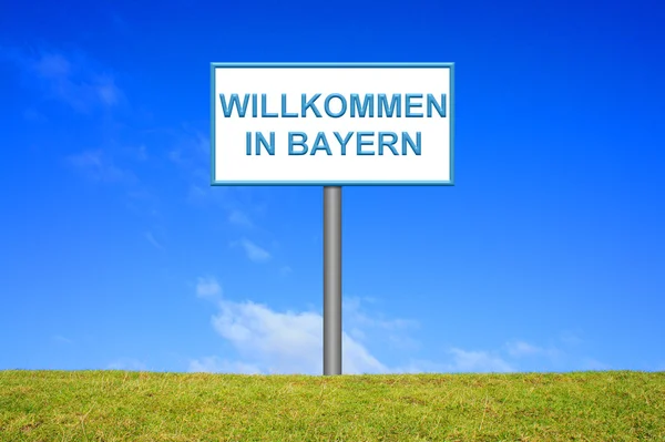 Wegweiser zeigt Willkommen in Bayern — Stockfoto