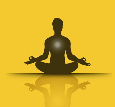 Lotus duruşu üzerinde meditasyon yapan bir adamın silüeti.