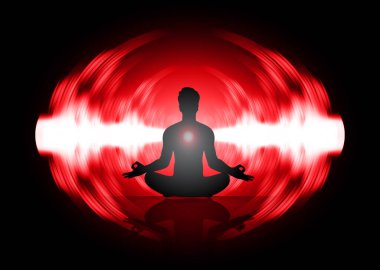 Lotus pozunda meditasyon yapan bir adamın silüeti.