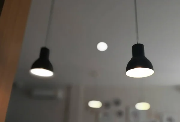black lamps on the ceiling