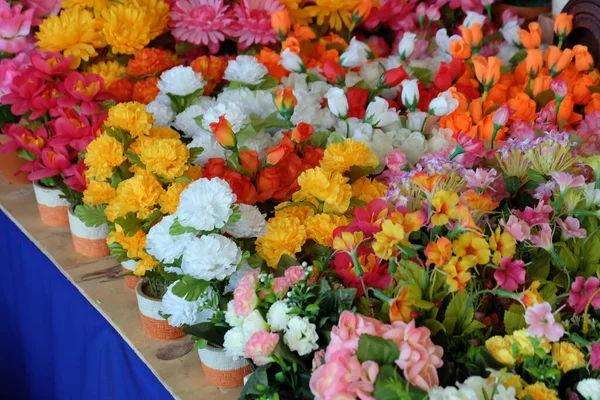 beautiful colors of plastic flowers. Colorful Artificial flower