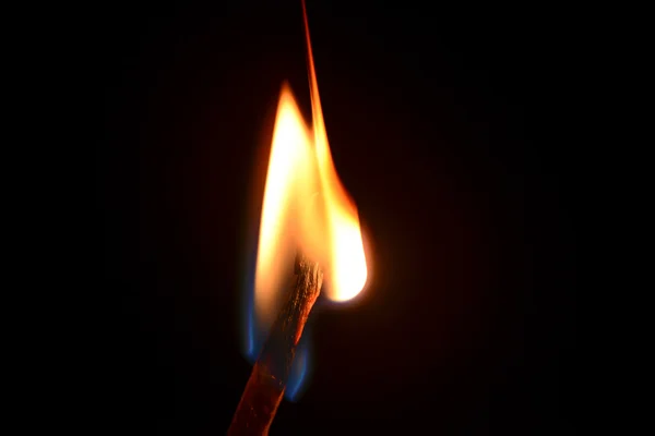 Match fire isolated on black background — Stock Photo, Image