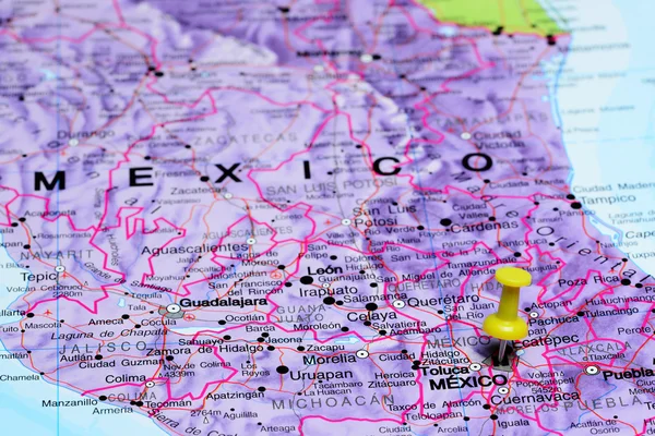 Mexico city pinned on a map of Mexico