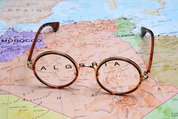 Gafas en un mapa - Argelia — Foto de Stock