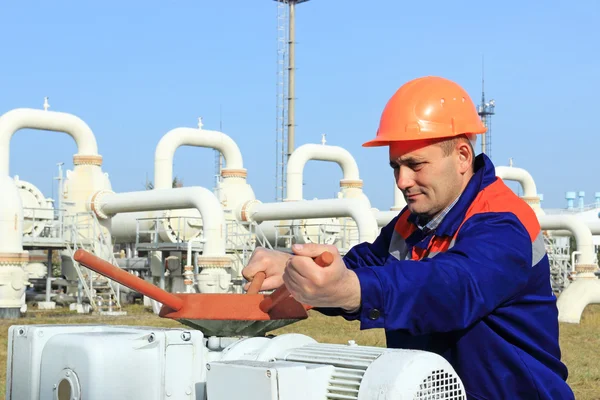 Worker opening bypass valve — Stock Photo, Image