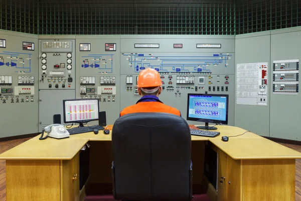 Engineer sitting at workplace — Stock Photo, Image