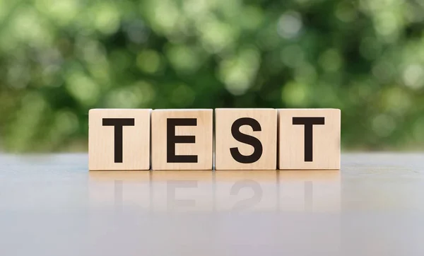 Test word written on wooden blocks. Business concept. Test sign, exam, learning concept. Education quality control. Medical concept