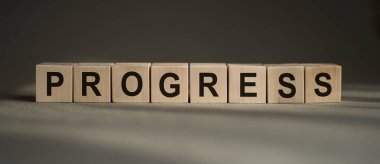 Tahta küp bloğu üzerine metin PROGRESS, hisse senedi yatırım konsepti.