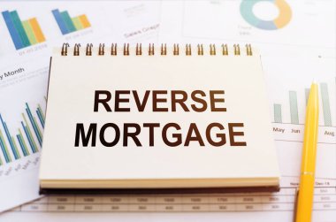 Finansal tablolarda not defterine ve sarı kalemli grafiklere tersi yazıldı..