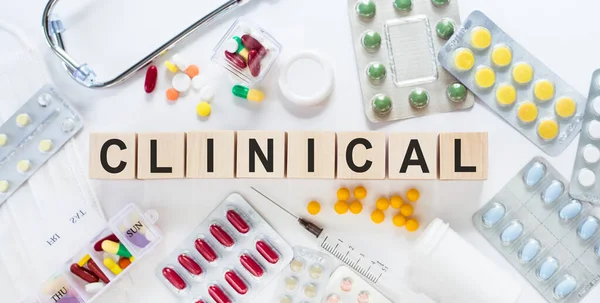 Clinical Medicine Word Wooden Blocks Desk Medical Concept Pills Vitamins — Stock Photo, Image