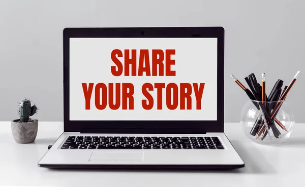 Laptop Share Your Story Text Modern Office Background — Stockfoto