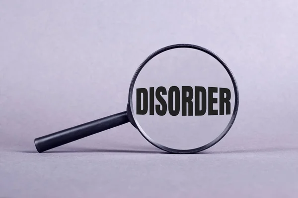 Magnifying Glass Disorder Lettering Gray Background — Stock Photo, Image