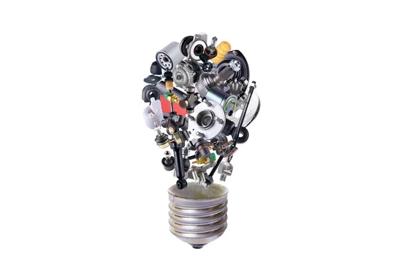 Auto spare parts items in bulb idea — Stock Photo, Image