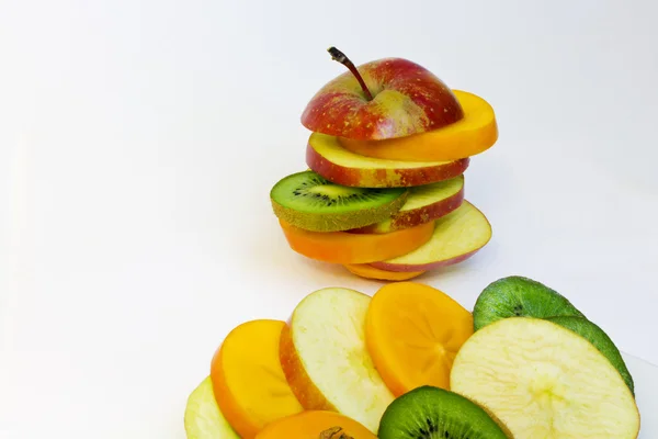 Red apple kiwi persimmon — Stock Photo, Image