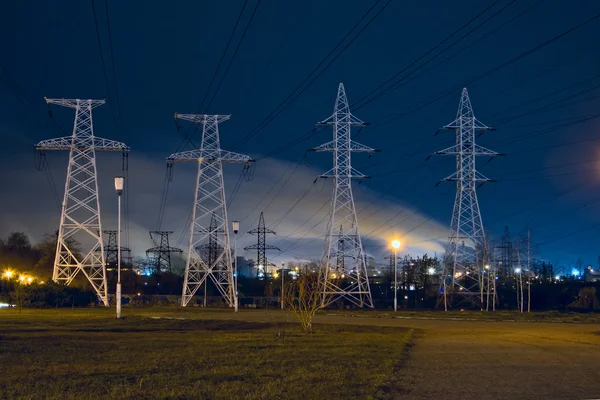 Impression network at transformer station in sunrise, high voltage, horizontal frame — Stock Photo, Image