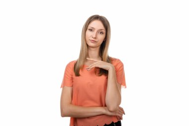 Portrait of displeased girl with blonde straight hair, gesturing with raised palm, frowning, being displeased and confused with dumb question. Human emotions concept