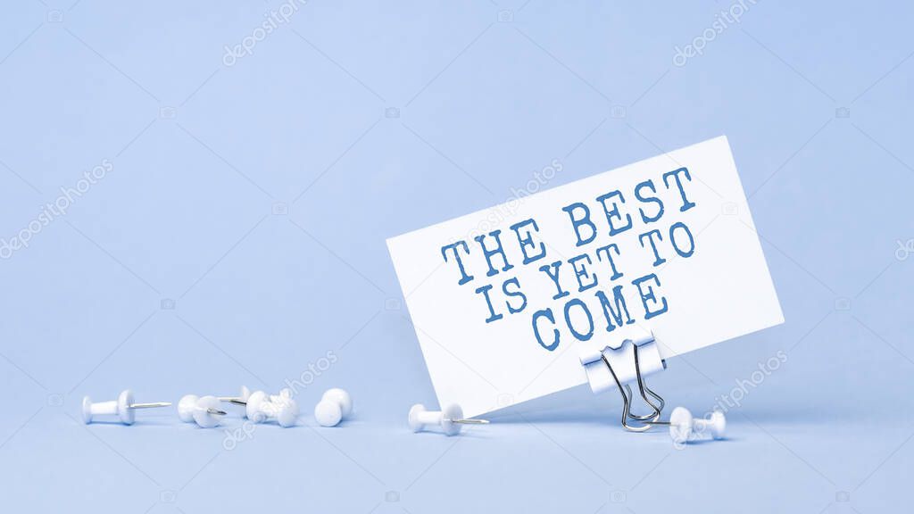 The best is yet to come - concept of text on business card. Closeup of a personal agenda