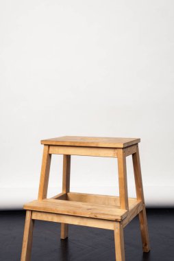 Studio shot of wooden chair. Series of furniture. Modern designer chair on white background