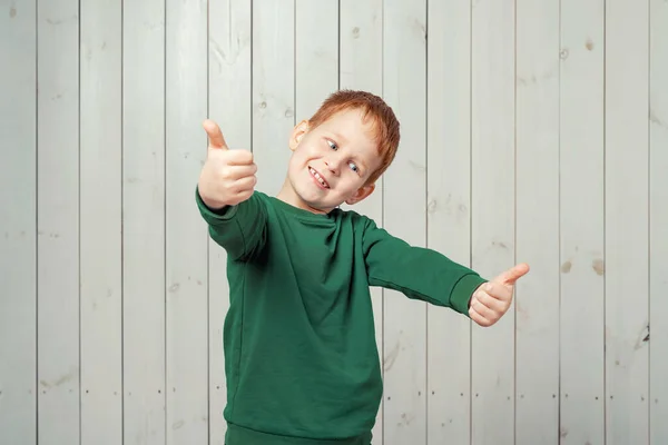 Portrait Happy Ginger Little Boy Years Old Casual Clothes Showing — Stock Photo, Image