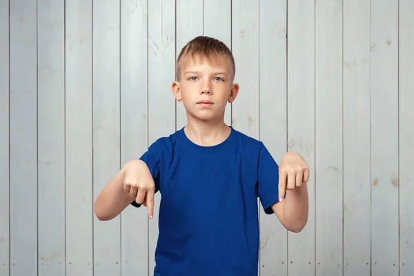 Portrait Handsome Preteen Boy Blue Shirt Pointing Fingers Studio Shot — Stock Photo, Image