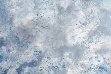 Blue texture pattern with veins is similar to the planet view from above useful as background or texture. Stone texture background. Texture wall