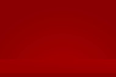 Kırmızı duvar arka planında kırmızı masa üstü. Noel ve dekorasyon konsepti