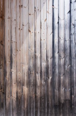 Eski ahşap dokular. Ahşap duvar dikey tahtası, doğal bir dizaynı var. Tasarım ve doku arka planınız için harika