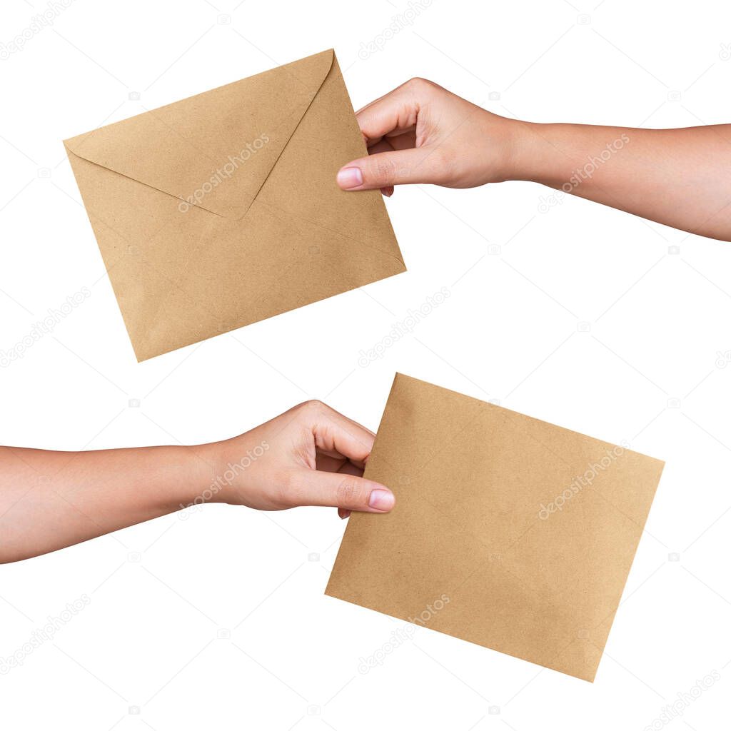 Woman hands holding blank brown envelope isolated on white background. Objects with clipping path and copy space. Business and finance concept