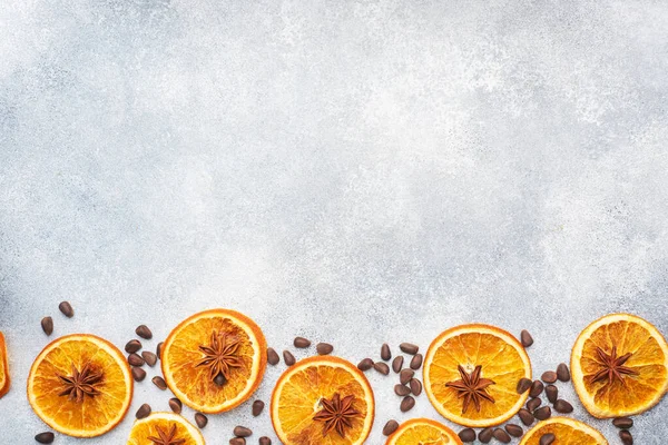 Christmas Composition Dried Oranges Cinnamon Anise Nuts Gray Concrete Background — Stock Photo, Image
