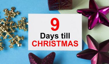 Noel 'e 9 gün kala içinde tebrik kartı olan Noel oyuncakları. Tebrikler için kullanılabilir.