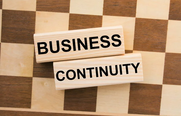 Σκακιέρα Ξύλινα Μπλοκ Κείμενο Business Continuity Φωτογραφία Έννοιας — Φωτογραφία Αρχείου