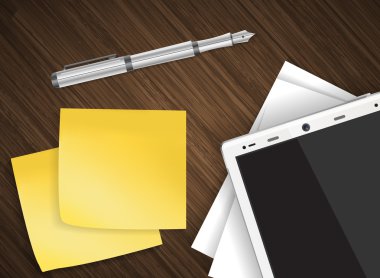 Ahşap masa sarı sopayla tablete vektör notları