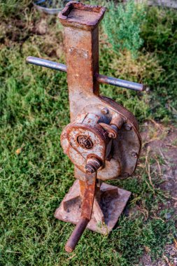 House lifting jack. Old rusty mechanical screw jack