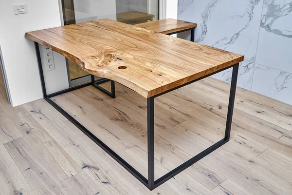 Live edge elm gaming desk countertop with metal base in a modern home office
