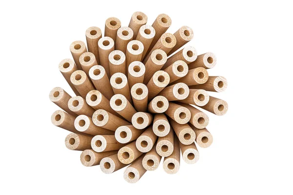 Dönmüş bacaklardan tahta çiçek, konsept. Tahta bacaklar, beyaz arka planda yalıtılmış bir çiçek gibi katlandı.