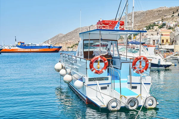 Symi Greece July 2017 Moored Motorboats Azure Sea Reflection Historical — 스톡 사진