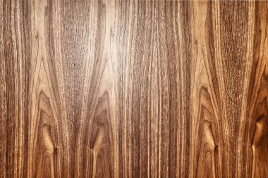 Tasarım ve dekor için arkaplan olarak soyut desenlere sahip harika ceviz ağacı kaplaması yukarıdan yakın görünüm