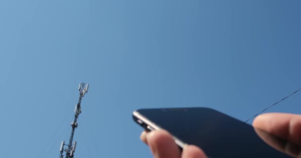 Man Holds Mobile Phone His Hand Moves His Thumb Screen — Stock Video