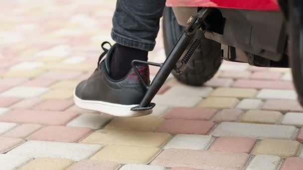 Person Raises Parking Step Moped His Foot Start Driving Parking — Stock Video