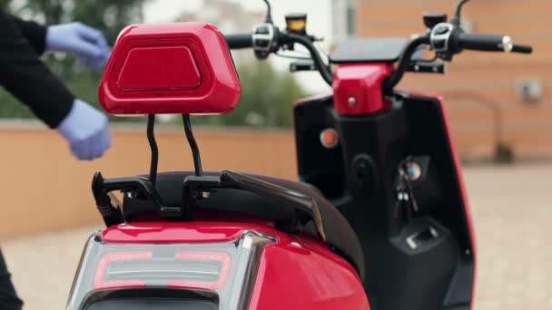 Man Gets Wheel Red Electric Moped Ready Start Driving — Stock Video