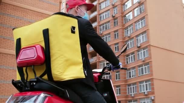 Courier Moped Appears Frame Stops Checks Delivery Address Phone Drives — Stock Video