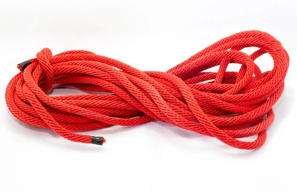 Stáčené tlusté lano na bílém pozadí — Stock fotografie