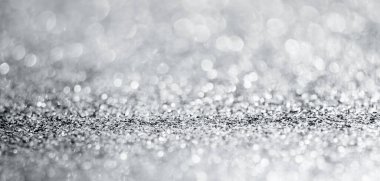 Soyut gümüş parıltı arkaplanı bokeh olan ışıltılı desen